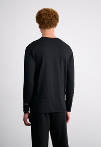 Ellesse QUINZANO - Ilgarankovis viršutinės dalies drabužis - black