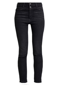 Jeans ajustados de tiro alto en negro, fabricados en denim, con una textura suave, dos bolsillos frontales y cierres de botón metálico visibles.