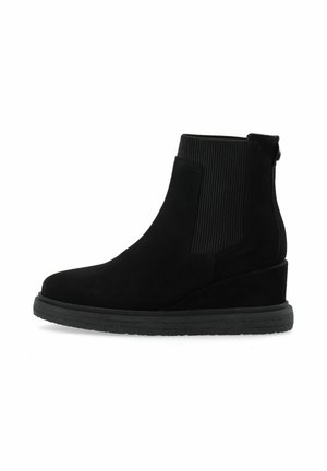 Black suede ankle boots with elastic side panels, rounded toe, and a wedge heel. Textured rubber sole enhances grip and durability.