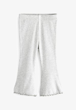 Leggings acampanados de canalé gris claro con un dobladillo ondulado y una cintura elástica. La tela texturizada proporciona un ajuste ceñido y flexibilidad.