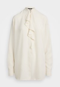 Cream-colored blouse with a stand-up collar, front button closure, and cascading ruffle detail along the placket. Long sleeves, smooth texture.