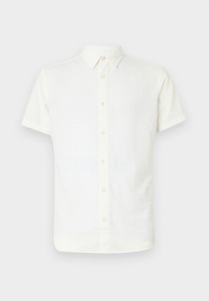 Chemise blanche à manches courtes avec boutons, en tissu léger, dotée d'un col classique et d'une texture douce et lisse, agrémentée de boutons de couleur beige clair.