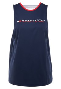 Marinblå ärmlös topp i slätt tyg. Har rund halsringning med röd kant och vittryckt "TOMMY SPORT"-logotyp över bröstet.