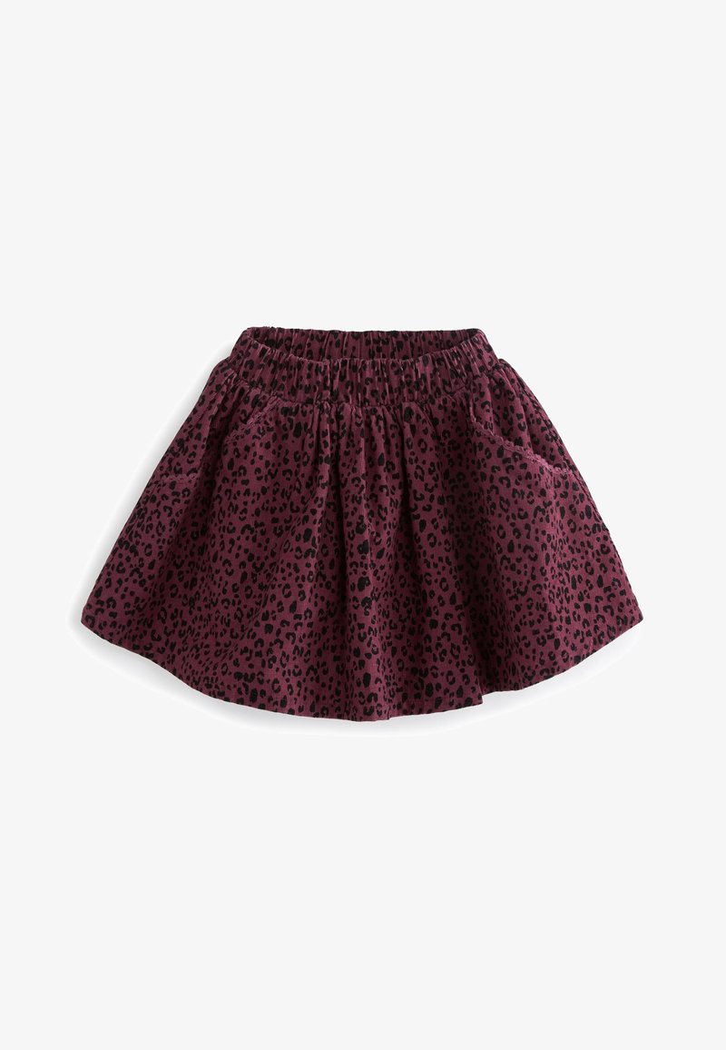 Jupe violette avec imprimé léopard noir, taille élastique et poches latérales, posée à plat sur fond blanc.