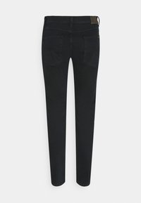 Svarta denimjeans med slim fit-design, med två bakfickor och en sydd midja. Slät textur och minimal detaljering.