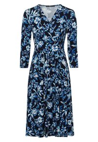 Vestido tipo envoltura floral con fondo azul marino y flores blancas y azules, mangas largas y cintura ajustada. Confeccionado en tejido elástico.