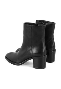 Schwarze Leder-Stiefeletten mit glatter Oberfläche, runder Spitze und mittelhohem Blockabsatz. Verfügt über einen seitlichen Reißverschluss für ein einfaches An- und Ausziehen.