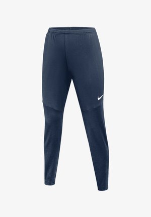 Marineblauwe sportbroek met elastische tailleband en taps toelopende pijpen, met een kleine witte Nike-swoosh op de rechterdij.