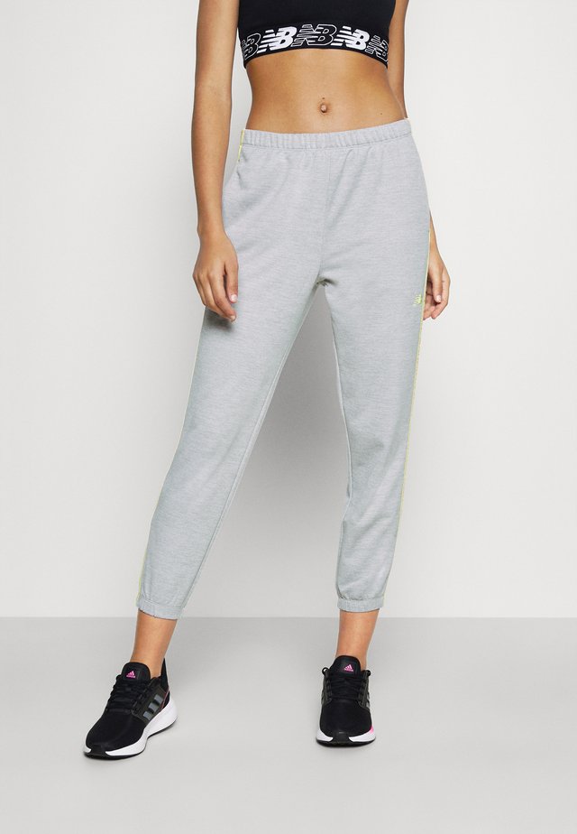 RELENTLESS JOGGER - Spodnie treningowe - athletic grey