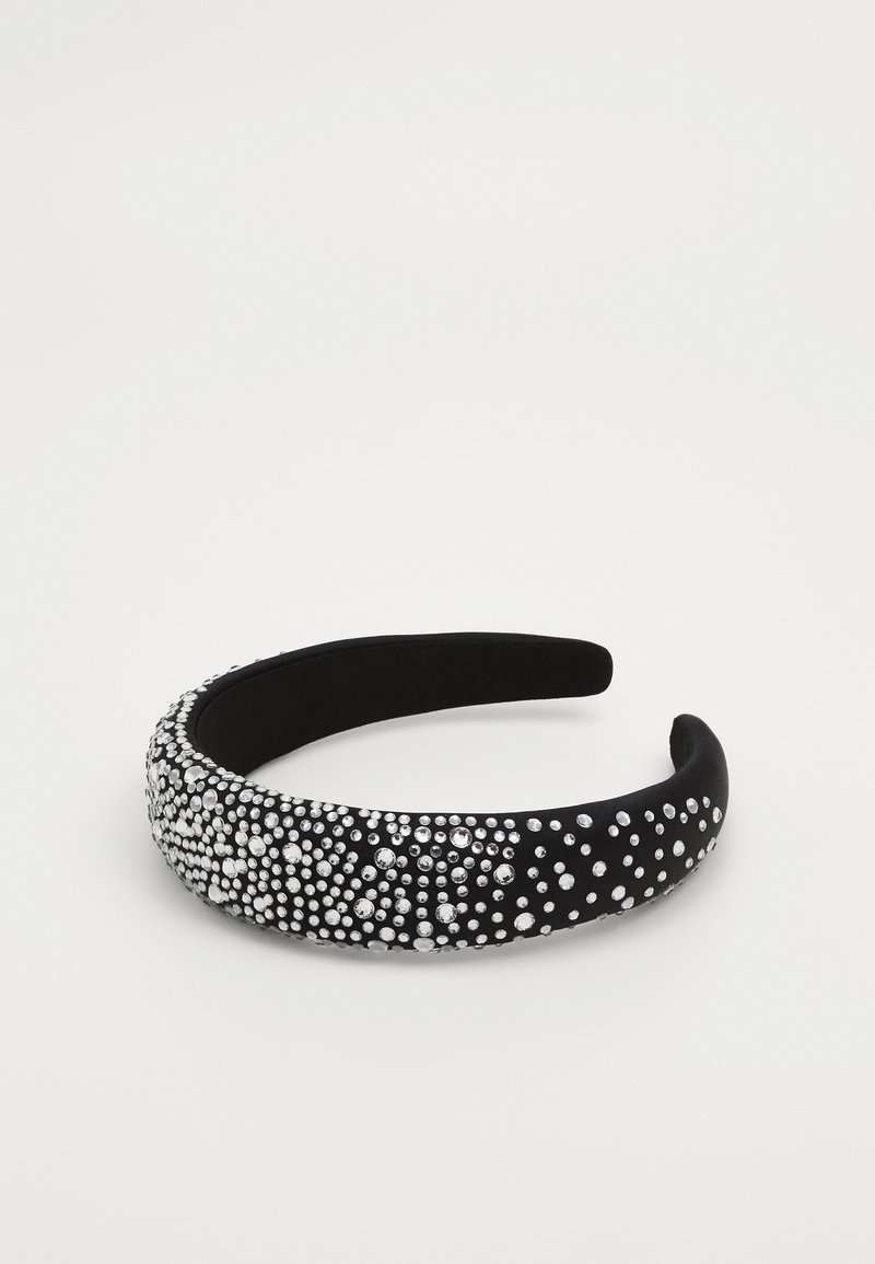 Black hairband with a smooth texture, adorned with varying sizes of clear rhinestones arranged in a scattered pattern.
