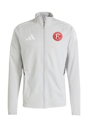 Giacca grigio chiaro con zip, maniche lunghe, logo Adidas bianco e stemma rosso del Fortuna Düsseldorf F95 sul petto.