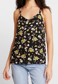 Top nero senza maniche con scollo a V, caratterizzato da una stampa floreale in giallo, rosa e bianco, e spalline sottili. Tessuto leggero.