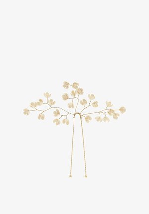 Accessorio per capelli color oro caratterizzato da delicati rami con piccole forme simili a fiori bianchi. Texture liscia e design elegante con estremità pendenti.