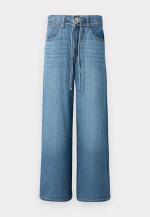 Wide-leg jeans in light blue denim. Features a button closure with a drawstring waist, five pockets, and a slightly faded finish.