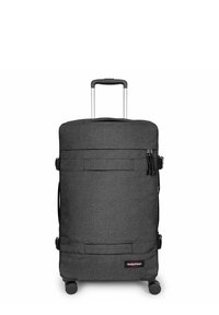 Schwarzer Stoffkoffer mit zwei geräuschlosen Rollen, Teleskopgriff, Vordertasche und Eastpak-Logo. Glatte Textur und rechteckige Form.