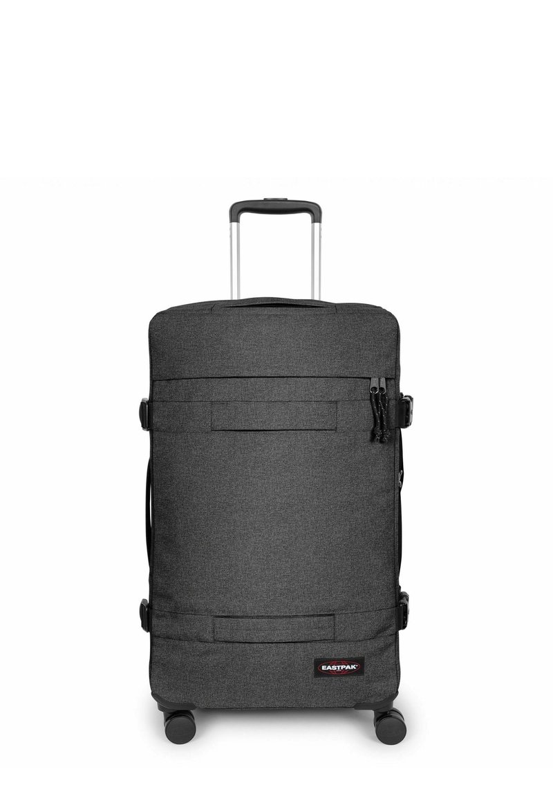 Schwarzer Stoffkoffer mit zwei geräuschlosen Rollen, Teleskopgriff, Vordertasche und Eastpak-Logo. Glatte Textur und rechteckige Form.