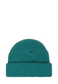 Turkos stickad mössa med ribbad textur och uppvikt kant, med en sömlös design och en snug passform.