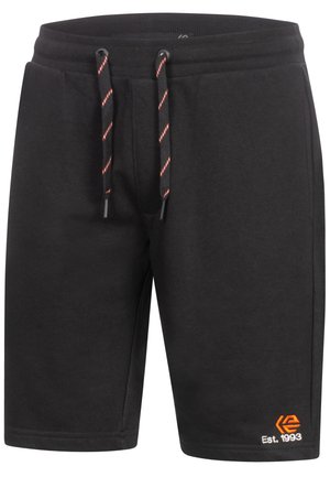 Shorts en coton noirs avec une taille élastique et des cordons de serrage rouges, arborant un logo orange et une broderie "Est. 1993" sur la jambe.