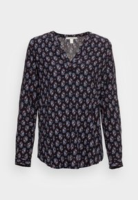 Schwarze Bluse mit langen Ärmeln und V-Ausschnitt, mit floralem Muster in Blau, Rot und Weiß. Hergestellt aus leichtem Stoff mit einem leicht fallenden Schnitt.