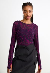 Puma DARE TO LONG SLEEVE TEE - Langarmshirt - midnight plum
