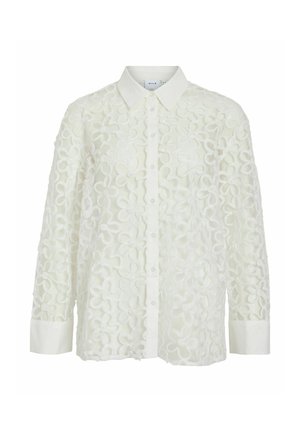 White shirt featuring floral embroidery, button-up front, pointed collar, and long sleeves with contrasting cuffs. Textured fabric design.
