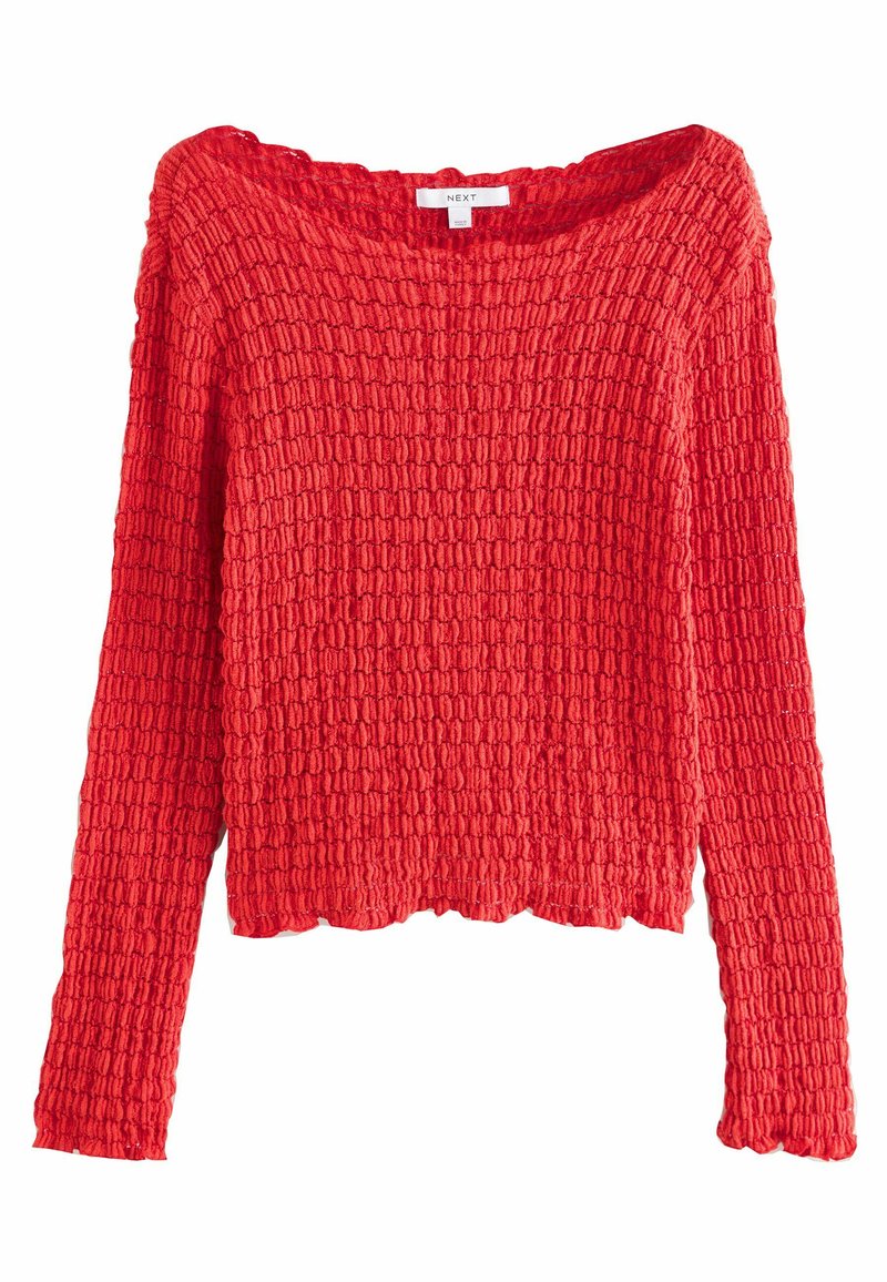 Pull rouge avec un décolleté bardot, motif tricoté texturé, manches longues et ourlet en zigzag. Fabriqué en matériau de fil doux.
