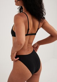NA-KD Haut de bikini - black