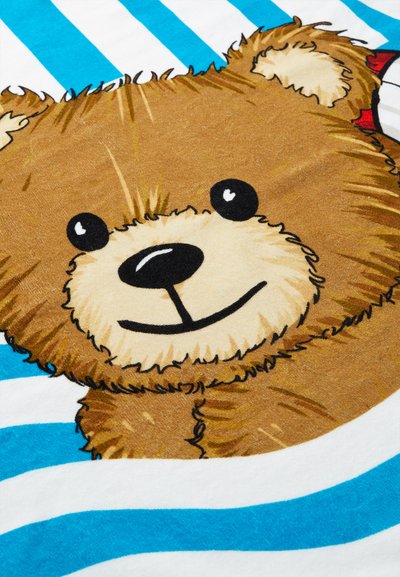 Bear print on fabric with brown fur texture, large black eyes, and a smile. Surrounded by alternating white and blue stripes.