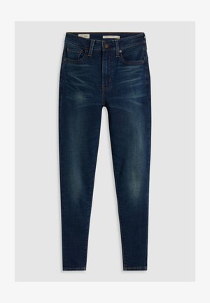 Dunkelblaue Denim-Jeans mit schmaler Passform, ausgestattet mit fünf Taschen, dezentem Ausbleichen und kontrastierenden Nähten. Hoch geschnittenes Design mit Reißverschluss.