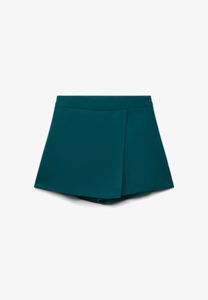 Gonna corta teal da donna con design avvolgente e zip nascosta sul lato, mostrata su uno sfondo bianco.