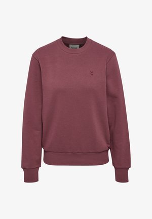Bordeauxrode crewneck trui met geribbelde boorden aan mouwen en zoom. Heeft een klein, ton-sur-ton logo op de borst. Zacht katoenmengsel materiaal.