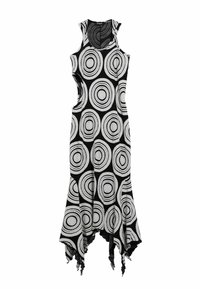 Svart och vit klänning med cirkulära mönster, utan ärmar, asymmetrisk nederkant och textil med fransade kanter.