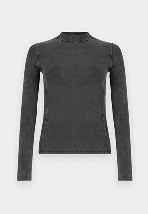 Zwart langreet t-shirt gemaakt van ribbelstof, met een hoge halslijn en een slim fit. Stikdetails benadrukken de vorm.