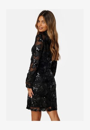 Zwarte bloemen paillettenjurk met doorschijnende lange mouwen en een fitted pasvorm, met een textuurstof en een lengte tot de knie.