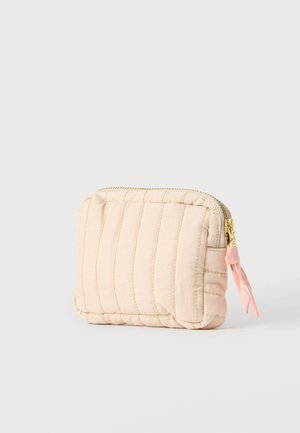 Small rectangular beige quilted pouch with gold zipper and a pink fabric pull tab on a white background.