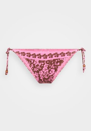 Bikini bottom in pink and brown floral pattern. Features adjustable ties with wooden beads on each side. Made of stretchy fabric.