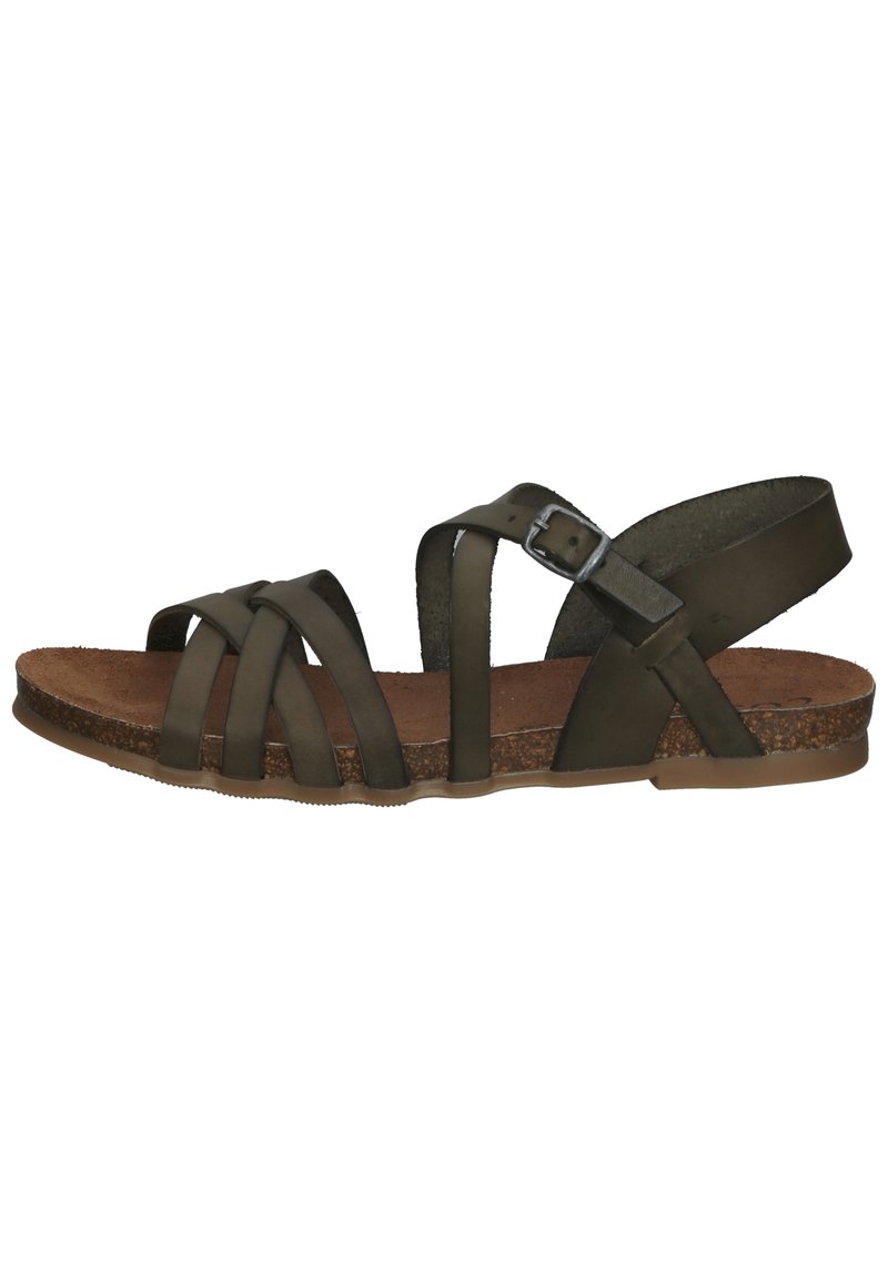Brown leather sandal with multiple crisscross straps, cork sole, and an adjustable ankle strap. Flat heel and textured footbed.