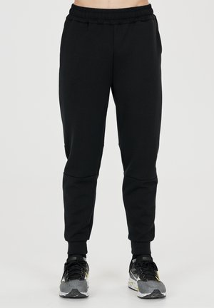 TARO - Trainingsbroek - black