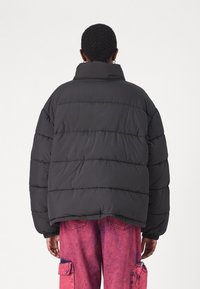 Tommy Jeans Chaqueta de invierno - black
