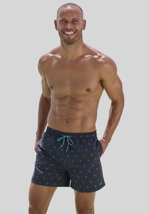 Herren Schwimmshorts in Dunkelblau mit kleinen Palmblatt-Mustern. Hergestellt aus leichtem Stoff, mit elastischem Bund und Kordelzug.
