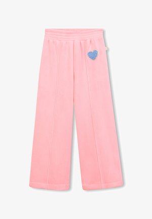 Calças largas de corduroy cor-de-rosa com um cós elástico e um patch em forma de coração azul adornado com pequenos strass na parte da frente.