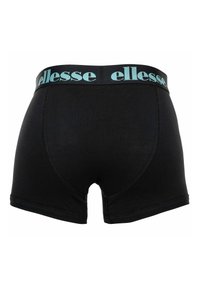 Boxer noir avec large ceinture élastique présentant le logo « ellesse » bleu clair, vu de dos.