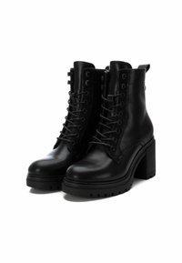 XTI Botines con plataforma - black