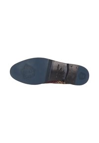 Semelle de chaussure en cuir avec une finition noire lisse, arborant un emblème décoratif, une forme profilée et un motif de texture pour une adhérence optimale.