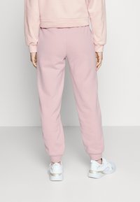 Puma LOUNGEWEAR SUIT  - Tuta - rose quartz