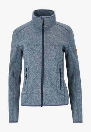 Blå fleecejacka med hög krage, framdragkedja och två sidofickor. Har kontrasterande sömmar och en logobadge på ärmen.