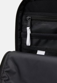 The North Face BASE CAMP VOYAGER TRAVEL PACK - Nahrbtnik - black/white