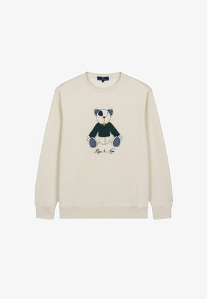 Crème sweatshirt met een teddybeer grafiek die een groene shirt draagt, geborduurd met "Hugo & Hugo" eronder. Zacht katoenen materiaal, relaxte pasvorm.