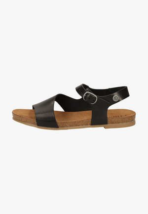 Zwarte leren sandalen met twee brede banden, een verstelbare enkelband met gesp, een kurken voetbed en een rubberen zool.