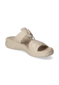 Lichtbeige sleehak sandaal met een gestructureerde band en twee ronde metalen accenten. Dikke, gewatteerde zool met een gestructureerd oppervlak voor grip.